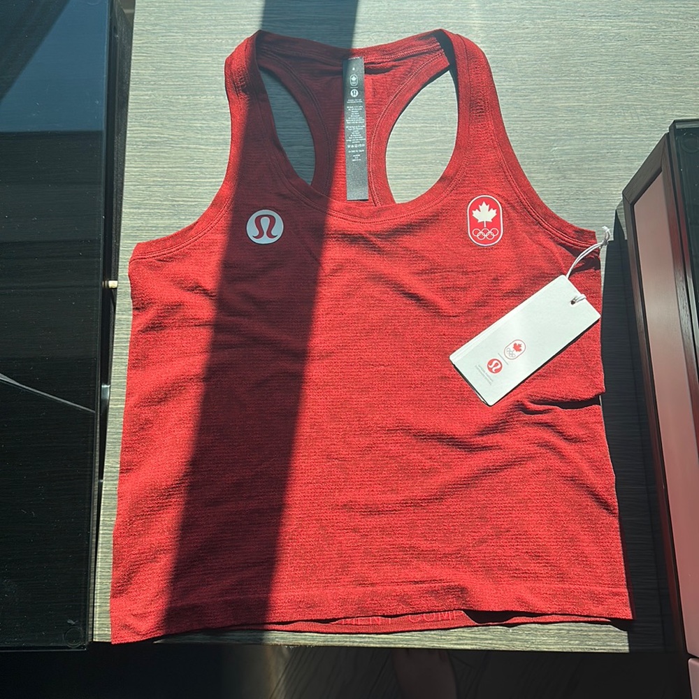 Brand new Lululemon Team Canada tank top in size 8. Never used